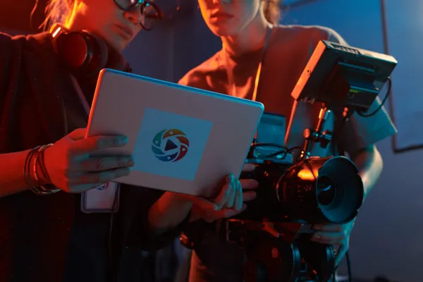 video-production-crew-discussing-footage-2026-03-24-07-19-24-utc-69e102dfd6866